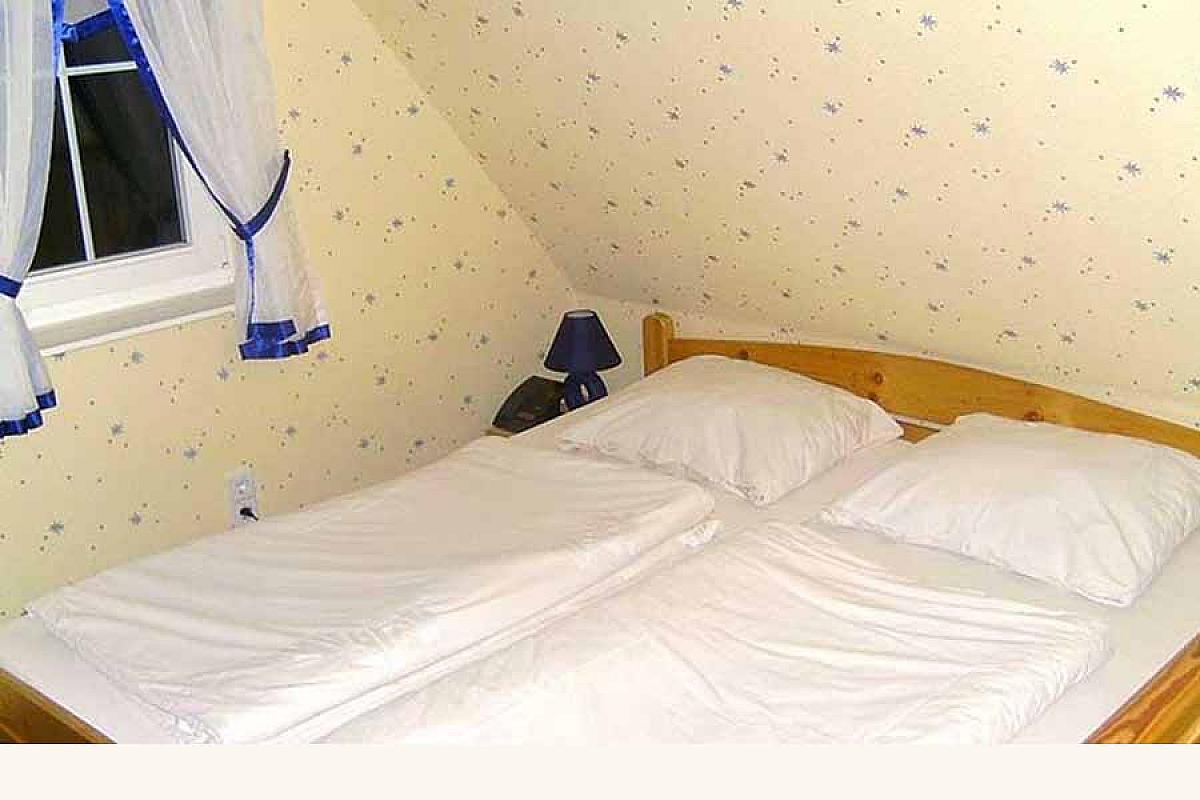 Ferienhaus Dolzke 1 - schlafzimmer-eins